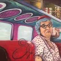 Heidi Pitre oil painting of two ladies on a bus wearing glasses and a hat with red seats