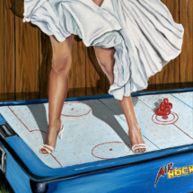 Heidi Pitre oil painting on Stonehenge paper of Marilyn Monroe from the seven year itch standing on an air hockey machine in front of wood panelling.